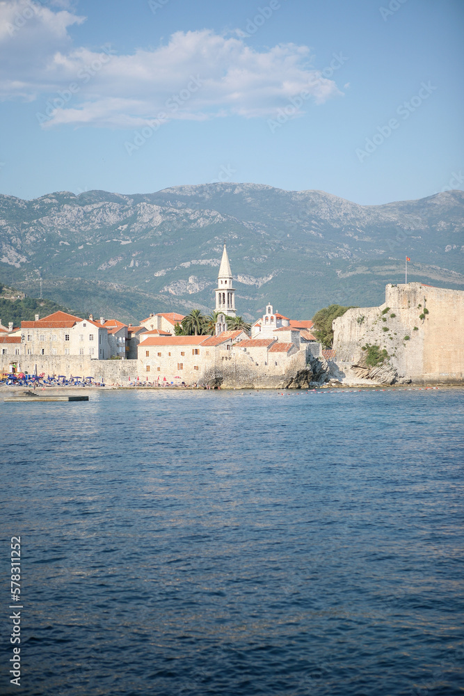 Seascape with old town Budva in the Adriatic sea for publication, design, poster, calendar, post, screensaver, wallpaper, postcard, banner, cover, website. High quality photo