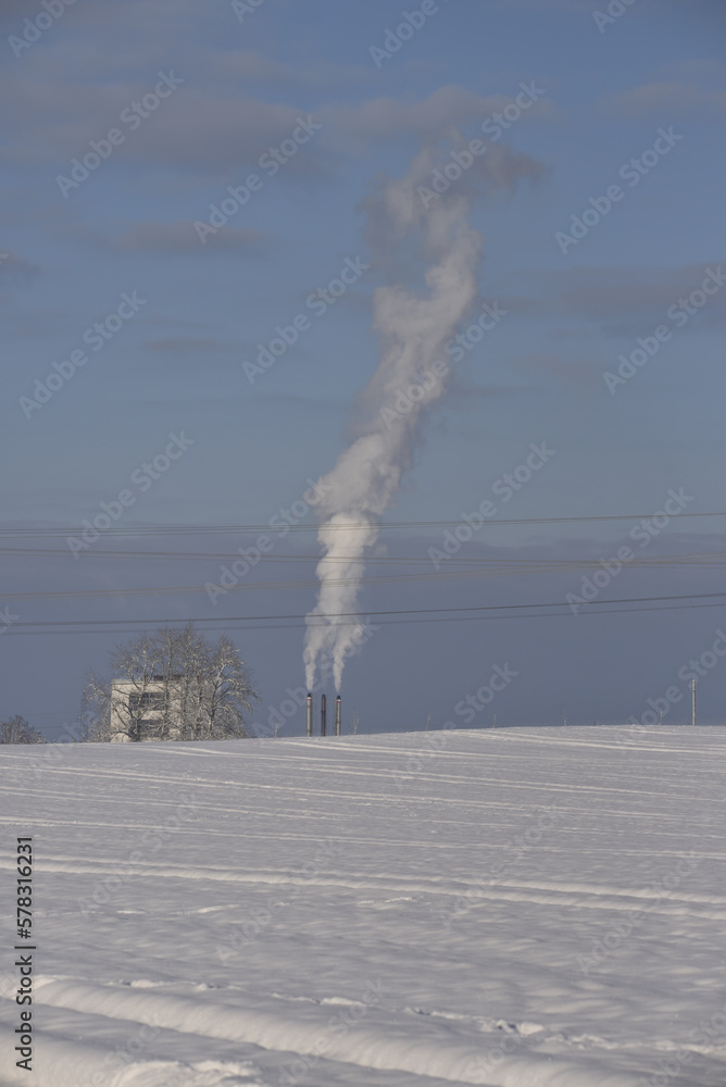 smoking industrial chimneys in winter scenery smoking industrial chimneys in winter scenery