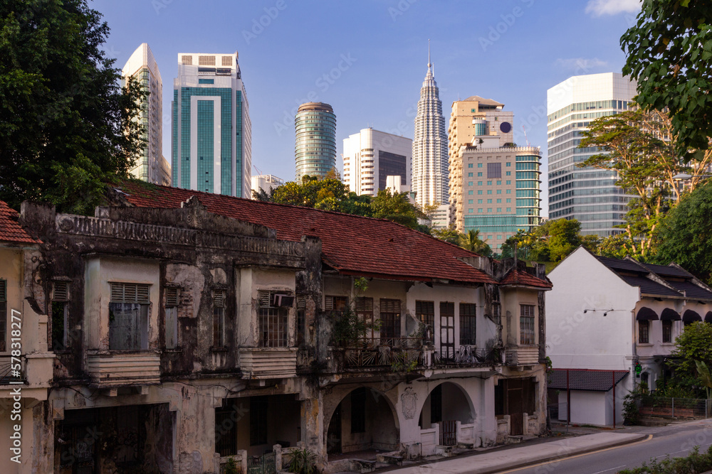 Kuala Lumpur’s modern skyscrapers tower over old colonial era property