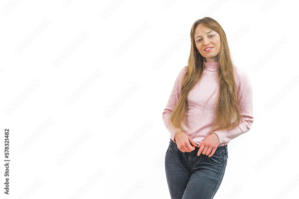 cowboy shot of a young beautiful woman in a pink shirt and jeans standing against a white background, copy space. High quality photo cowboy shot of a young beautiful woman in a pink shirt and jeans standing against a white background, copy space. High quality photo