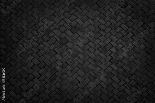 Fotografija Old black bamboo weave texture background, pattern of woven rattan mat in vintage style