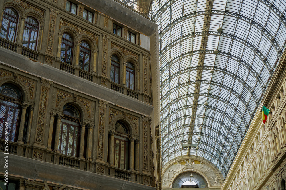 Naples, Italy inside Galleria Umberto I. Detail of glass-and-iron covered 19th century shopping gallery housing shops and cafes.