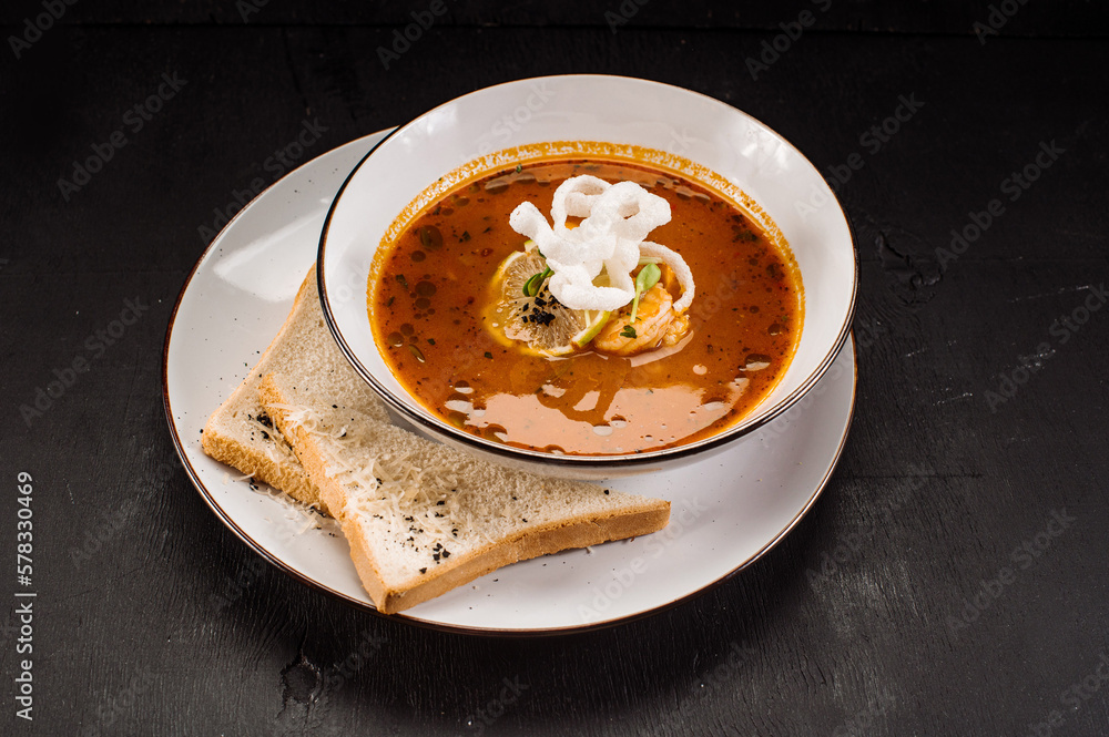 Traditional hungary soup bograch on wooden background Traditional hungary soup bograch on wooden background