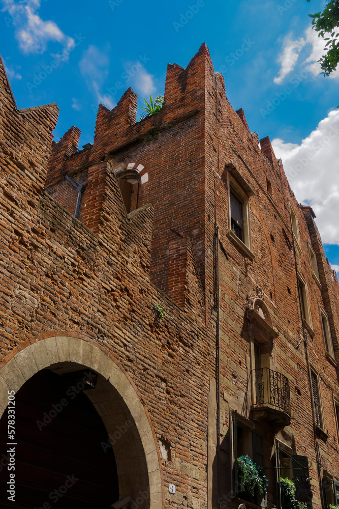 Verona, Italy Romeo house facade. Day view of casa di Romeo, 14th century home with crenelated walls.