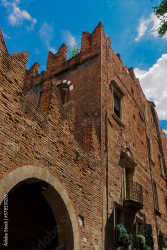 Verona, Italy Romeo house facade. Day view of casa di Romeo, 14th century home with crenelated walls. photo