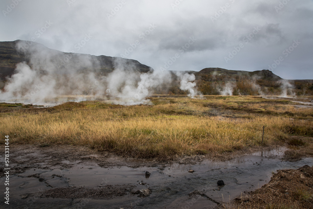 Iceland wild landscape with waterfalls and geysers in the autumn