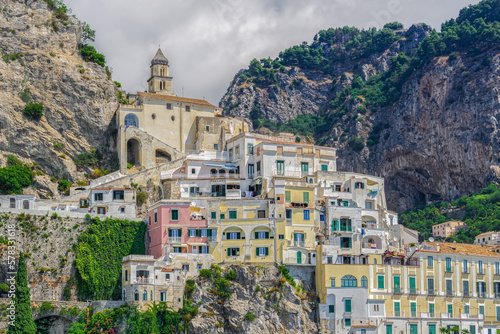 Amalfi Coast, Italy landscape view of low-rise traditional buildings at cliffs along the coastline in Costiera Amalfitana.