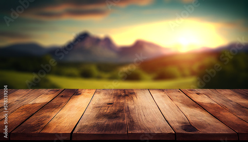 Empty wood table top with the mountain landscape. The blurred landscape of mountains background. Top view serenity. For montage product display layout.