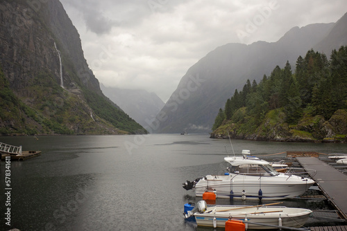 People, children enjoying the amazing views in Norway to fjords, mountains and other beautiful nature photo