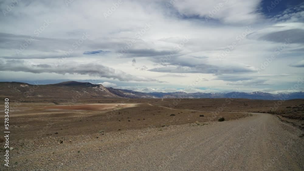 gravel road through the arid chubut region in Patagonia. gravel road through the arid chubut region in Patagonia.