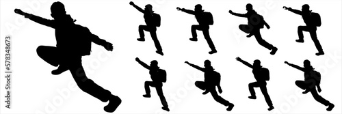 Climbing climb. Sport. A teenager with a backpack behind his back climbs up. Sideways. Boy going up on a slope. The traveler goes to the mountains with a backpack. Black silhouette isolated on white