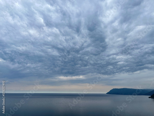 Heavy gray clouds over Baikal Lake, Russia