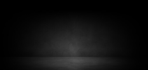 Empty dark abstract concrete room background with copy space for mock up, product display or banner design.