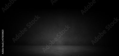Empty dark abstract concrete room background with copy space for mock up, product display or banner design.