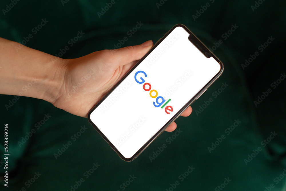 Mobile phone with the Google Logo on the screen Stock Photo | Adobe Stock