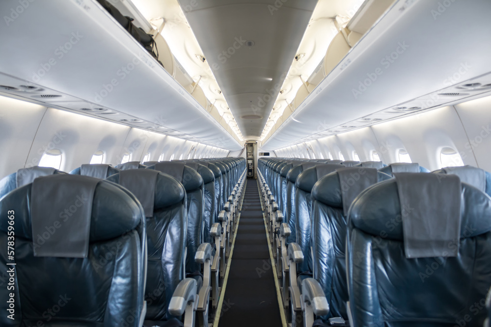 Fototapeta premium Inside empty passenger aircraft cabin