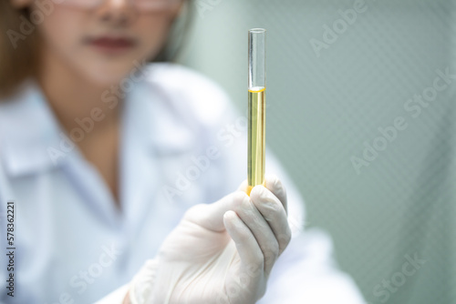 Scientist wearing glasses a...