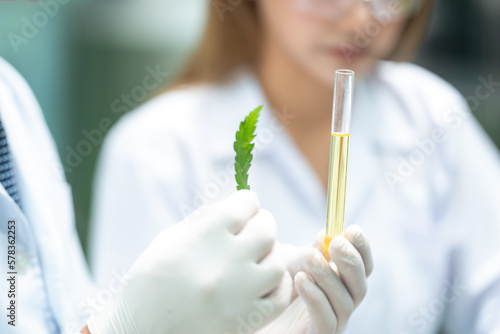 Scientist wearing glasses a...