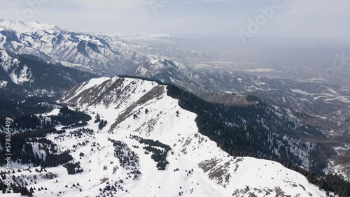 Aerial landscape of winter mountain valley photo