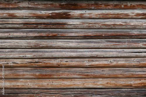Old Hewn Natural Log Cabin Or Barn Wall Frame Texture. Rustic Vintage Log Wall Square Background. Fragment Of Rural House Wall From Unpainted Wooden Debarked Logs Wallpaper.