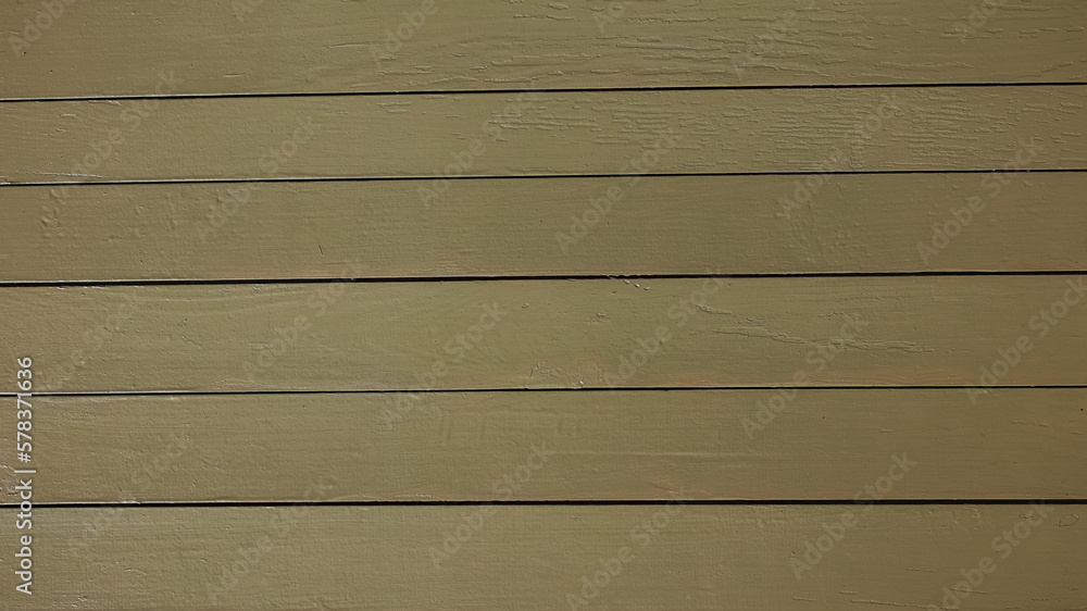 Wooden wall background is painted in yellow paint. High quality photo Wooden wall background is painted in yellow paint. High quality photo