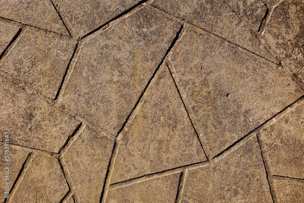 Obraz premium Texture of designer concrete facade with triangles.