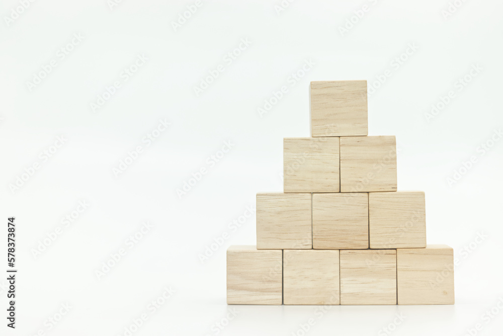 wooden blank block cubes arranged in pyramid shape on white background. wooden blank block cubes arranged in pyramid shape on white background.