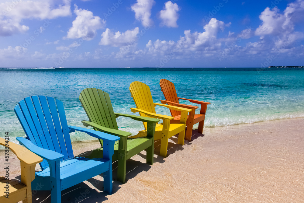 Wooden chairs on Caribbean beach