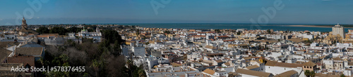 Fototapeta Naklejka Na Ścianę i Meble -  Panoramic shot of Sanlucar de Barrameda, a tourist and historical town located on the banks of the mouth of the Guadalquivir river in the province of Cadiz, in Andalusia, southern Spain