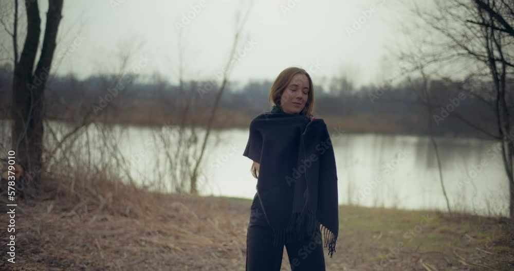 Portrait Of Woman Outdoors Dancing with Flowers Portrait Of Woman Outdoors Dancing with Flowers