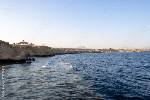 coastline of Egypt with dark blue water and clear blue sky