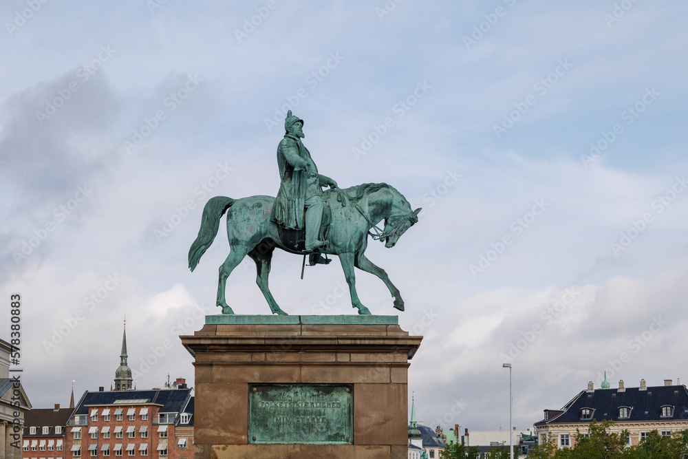 Selective focus at Frederik VII against cloudy sky in Copenhagen, Denmark.
