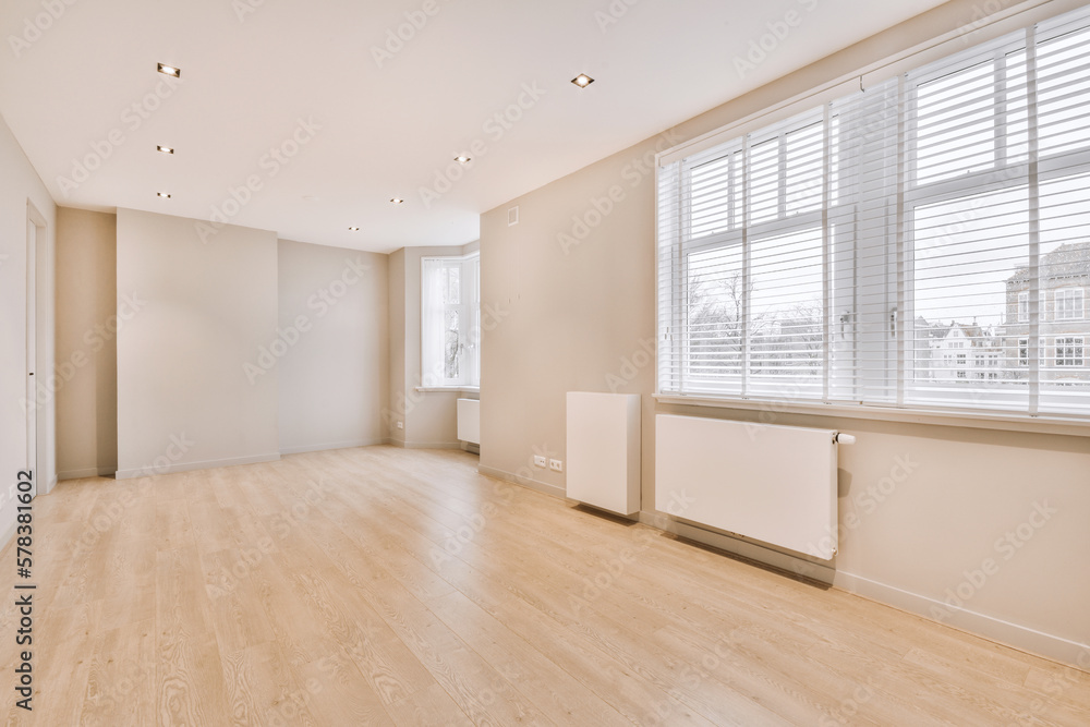 Interior of spacious room with blinds Interior of spacious room with blinds