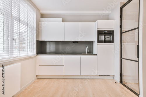Interior of spacious kitchen in apartment