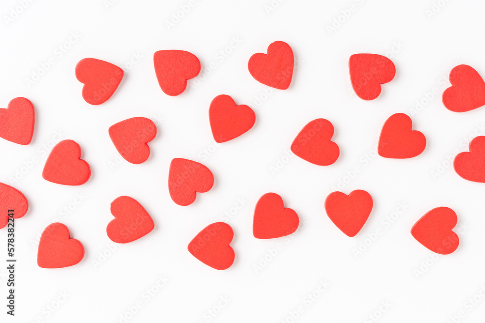 Overhead shot of red hearts on white background. Flat lay Overhead shot of red hearts on white background. Flat lay