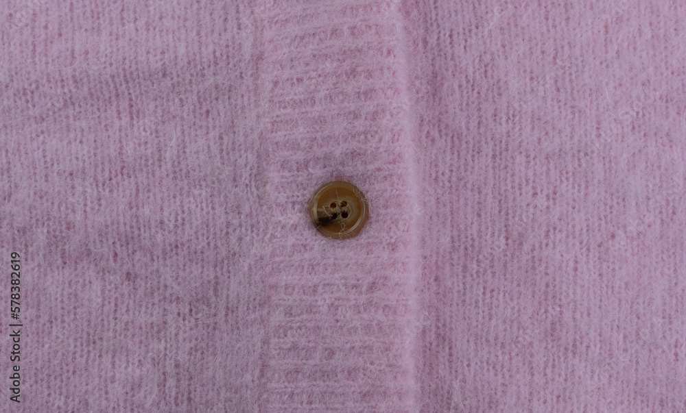 Pink mohair and alpaca wool from a cardigan as background Pink mohair and alpaca wool from a cardigan as background
