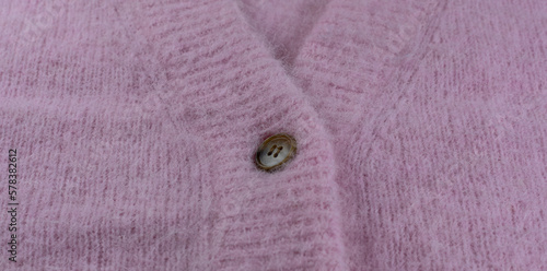 Pink mohair and alpaca wool from a cardigan as background