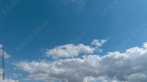 Wallpaper Mural Time lapse clouds, rolling puffy cloud are moving, white lightness clouds time lapse. Cloud running across the blue sky.4k Timelapse of white clouds with blue sky in background. Torontodigital.ca