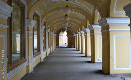 Yellow arched Colonnade of the Old Gostiny Dvor  Dumskaya Street  St. Petersburg  Russia   february2023