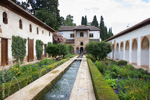 Views of the spectacular Patio de La Acequia in the gardens of the Generalife, Alhambra, Granada, Andalusia, Spain.