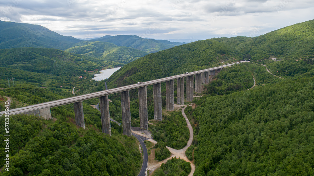 Aerial view of highway and beautiful natural landscape. Mountain bridge.