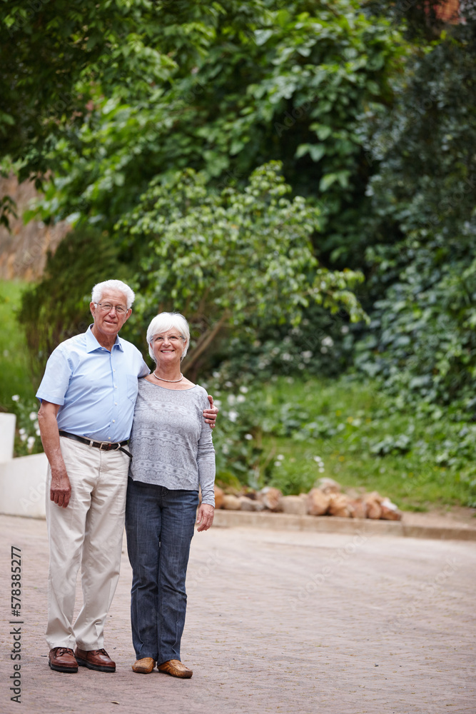 Forever and always. a happy senior couple standing outdoors while smiling at the camera. Forever and always. a happy senior couple standing outdoors while smiling at the camera.