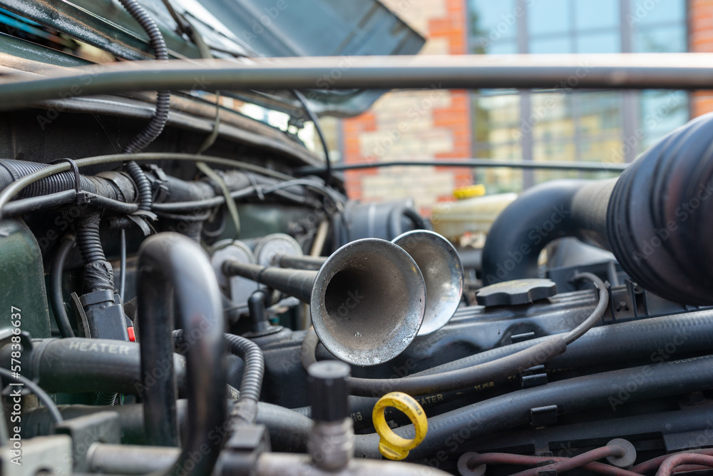 custom made wallpaper toronto digitalDetail view of the double horns of a classic SUV car inside the engine bay