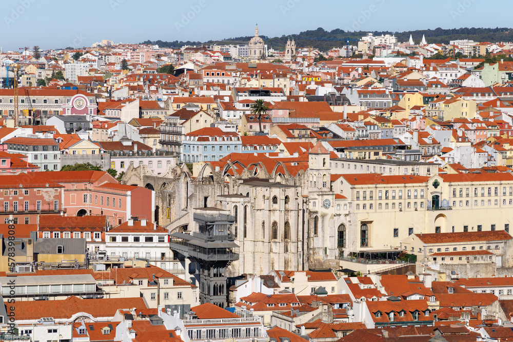 Lisbon, capital city of Portugal. Cityscape with Santa Justa Lift, Elevador de Santa Justa and ruined Carmo Church. Rooftop view over historic downtown Lisbon.