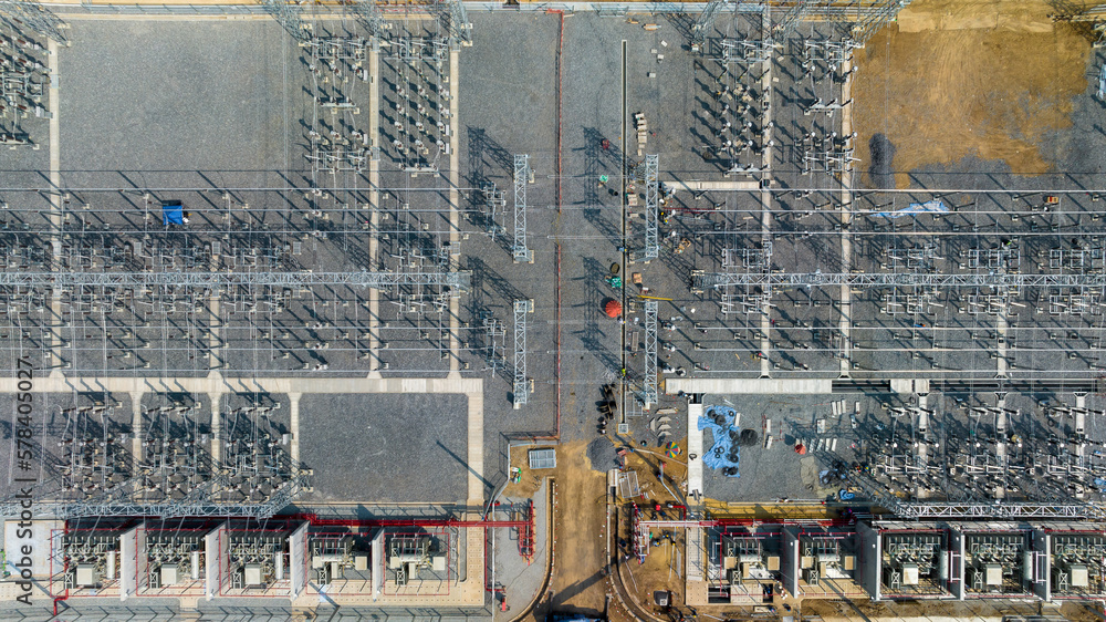 Aerial view substation with transformer high voltage electric power station, High voltage lines of electrical distribution station, Plant of electric station engineering construction.