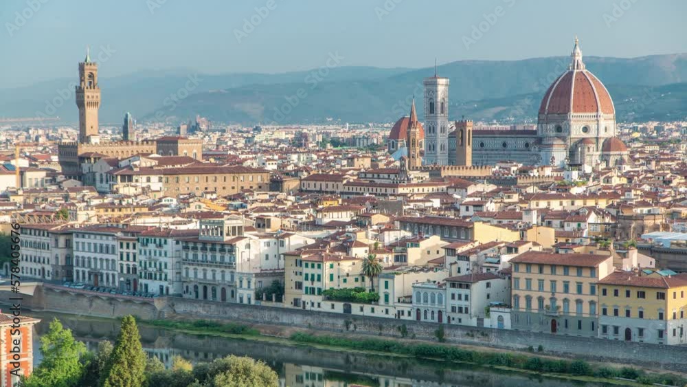 Palazzo Vecchio timelapse on piazza della Signora and Basilica di Santa Maria del Fiore in the morning as seen from Piazzale Michelangelo. Florence, Italy. Aerial top view. Mountains on background. Palazzo Vecchio timelapse on piazza della Signora and Basilica di Santa Maria del Fiore in the morning as seen from Piazzale Michelangelo. Florence, Italy. Aerial top view. Mountains on background.