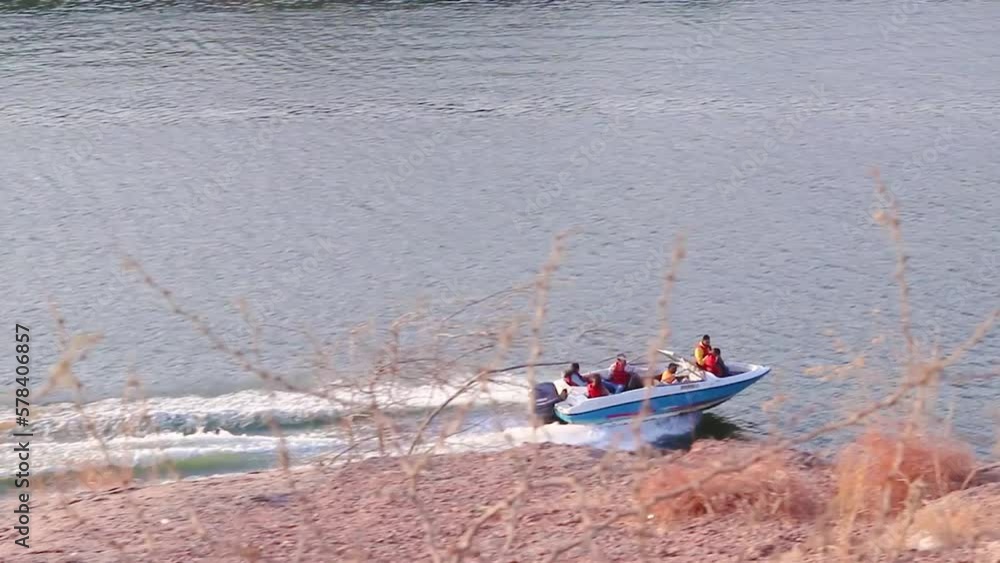 speedboat running fast at lake at day from top angle speedboat running fast at lake at day from top angle