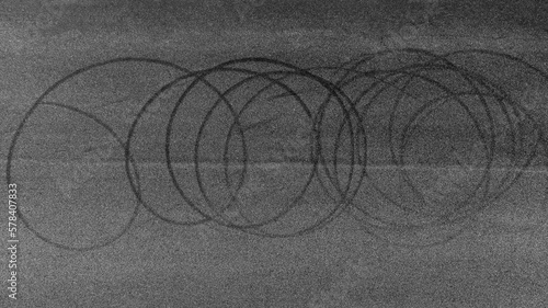 Foto Aerial view tire track mark on asphalt tarmac road race track texture and background, Abstract background black tire track skid on asphalt road, Tire mark skid mark on asphalt road