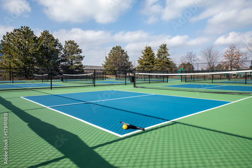 Pickleball Court Complex with Paddle and Ball © pics721