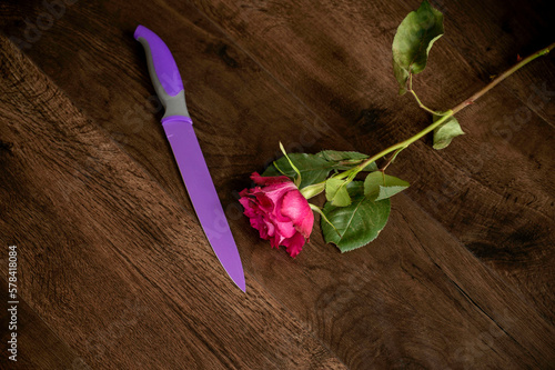  rose on floor next to knife murder scene